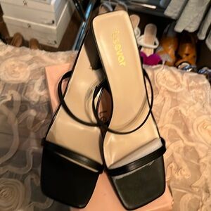 Women’s black heels size 10